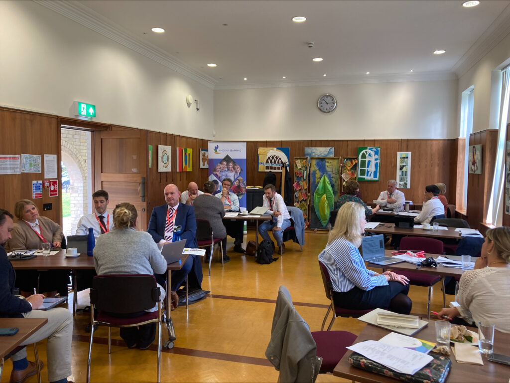 Groups of people sitting at tables