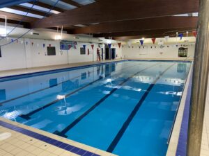 A large indoor swimming pool.